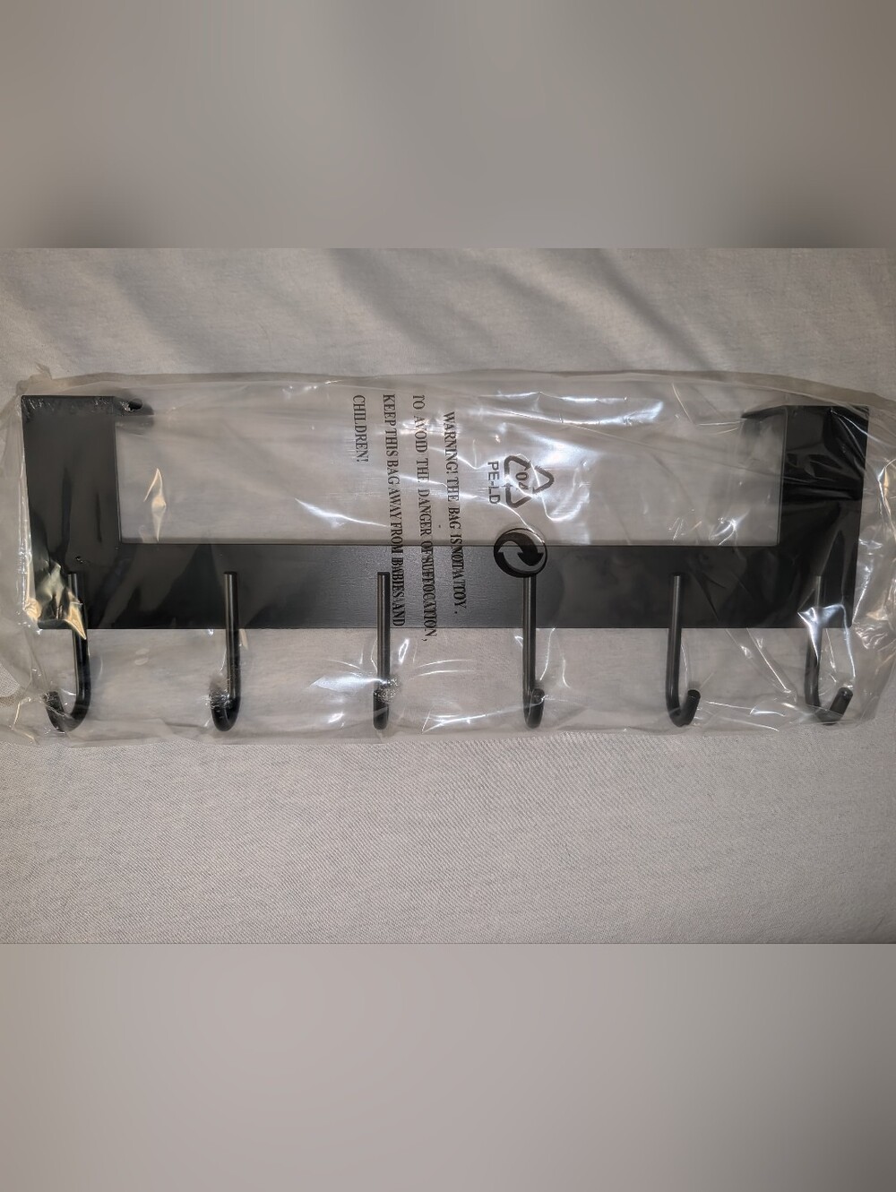 Over the Door Hooks in Black, 6 hooks, comes with pads for different size doors